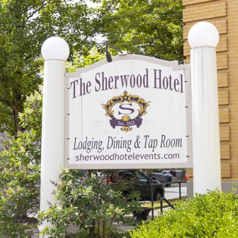 Freestanding The Sherwood Hotel sign with crest logo